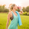 Athlete drinking water outdoors