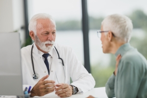 Doctor reviewing health information during a consultation
