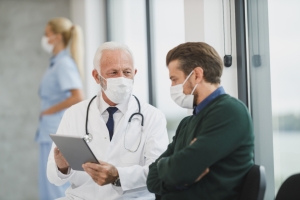 Doctor discussing testosterone therapy with a male patient