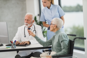 Doctor and nurse meeting with a patient