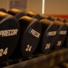 Row of dumbbells on a gym rack
