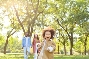 Family walking together in a park