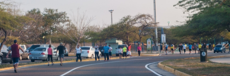 Group of people running together