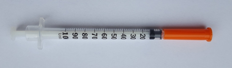 Insulin syringe with unit markings