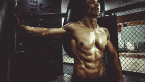 Lean, muscular man in a gym
