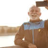 Smiling older man outdoors after exercise