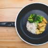 Rice and vegetables cooked in a pan