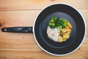 Rice and vegetables cooked in a pan