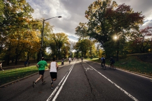 People walking and jogging in a park
