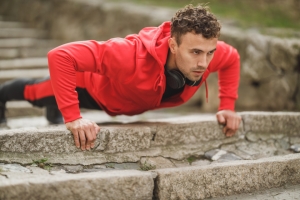 Man doing push-ups outdoors