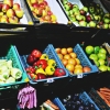 Crates of fresh vegetables at a market