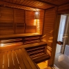 Wooden sauna with benches